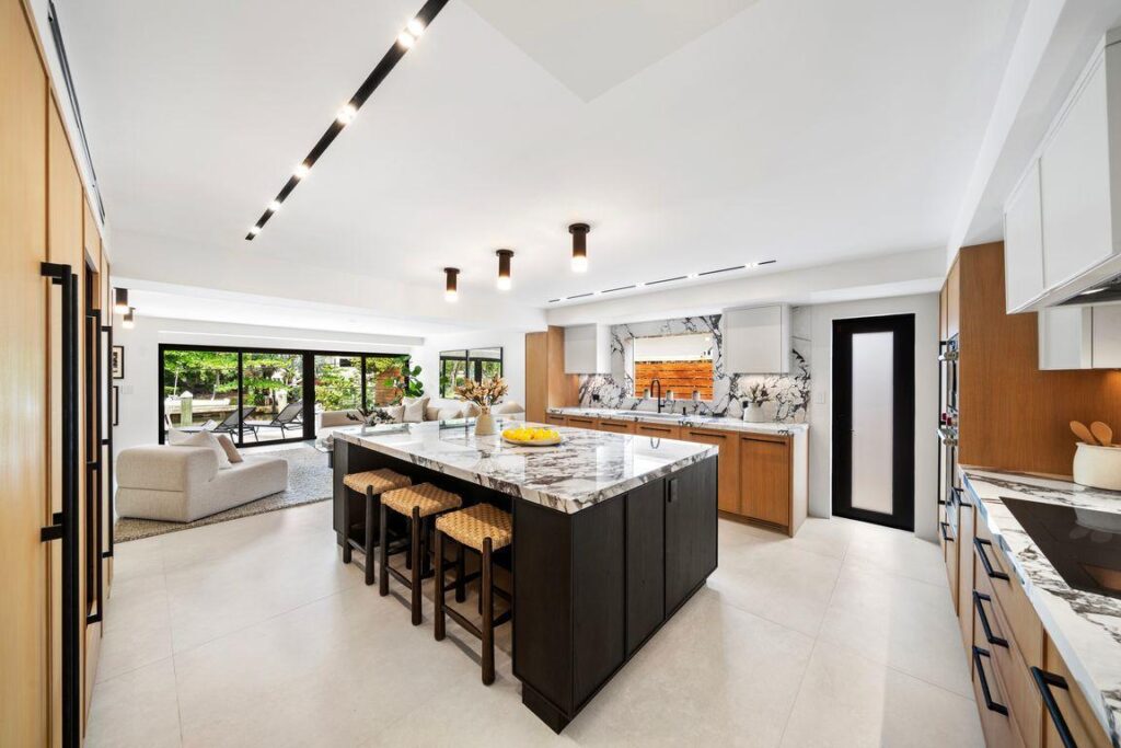 Modern kitchen remodeling project with an open layout and spacious island in South Florida.