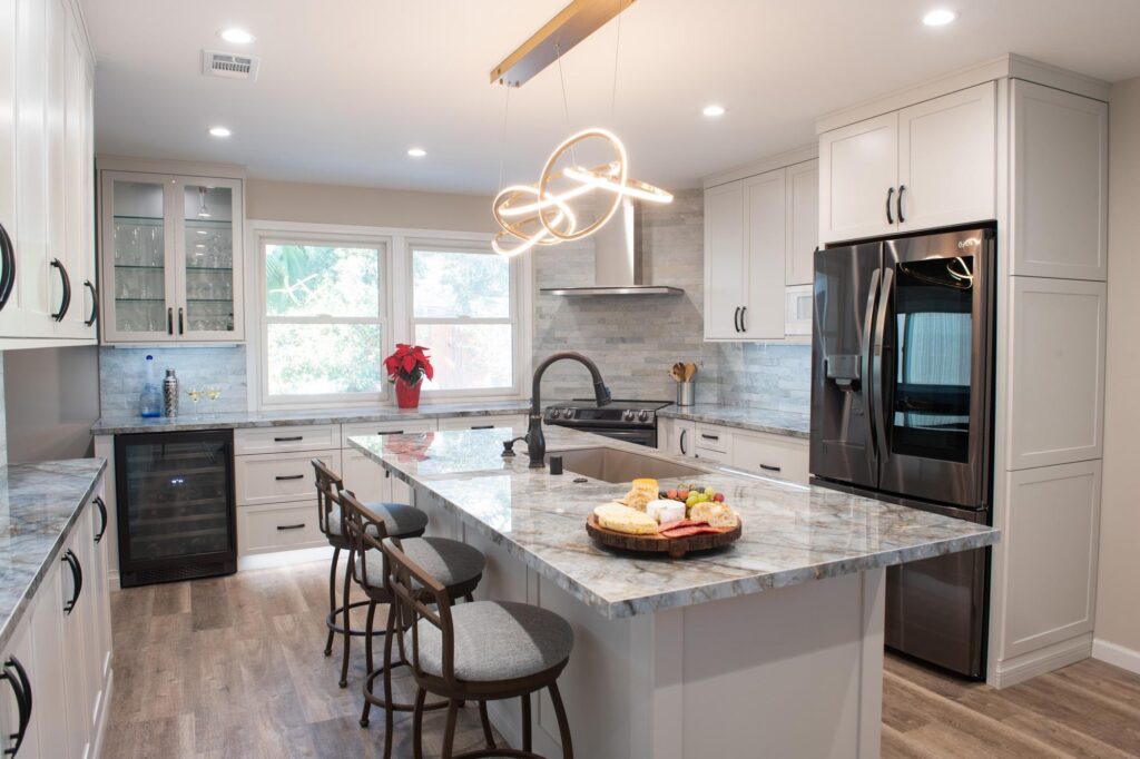 Completed kitchen renovation featuring custom cabinetry, improved storage, and a bright modern design
