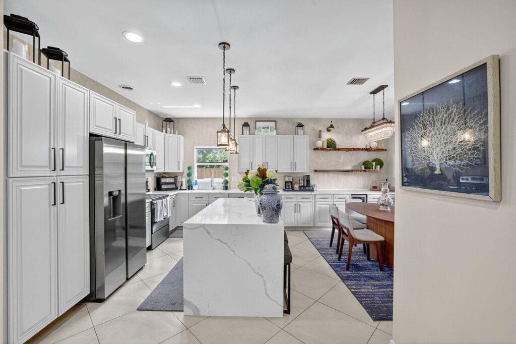 Completed luxury kitchen remodeling project with an open-concept design.