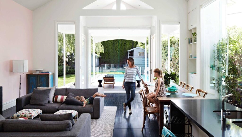 Family enjoying a spacious home addition that enhances comfort and long-term property value.