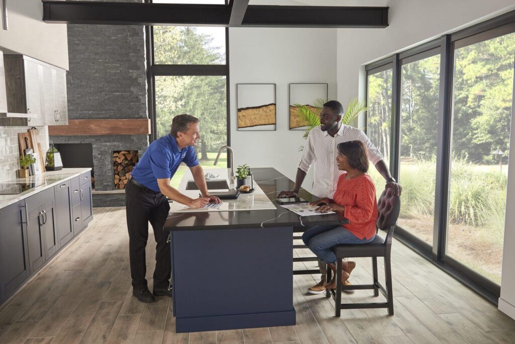 Florida homeowners discussing a personalized remodeling design with a professional contractor
