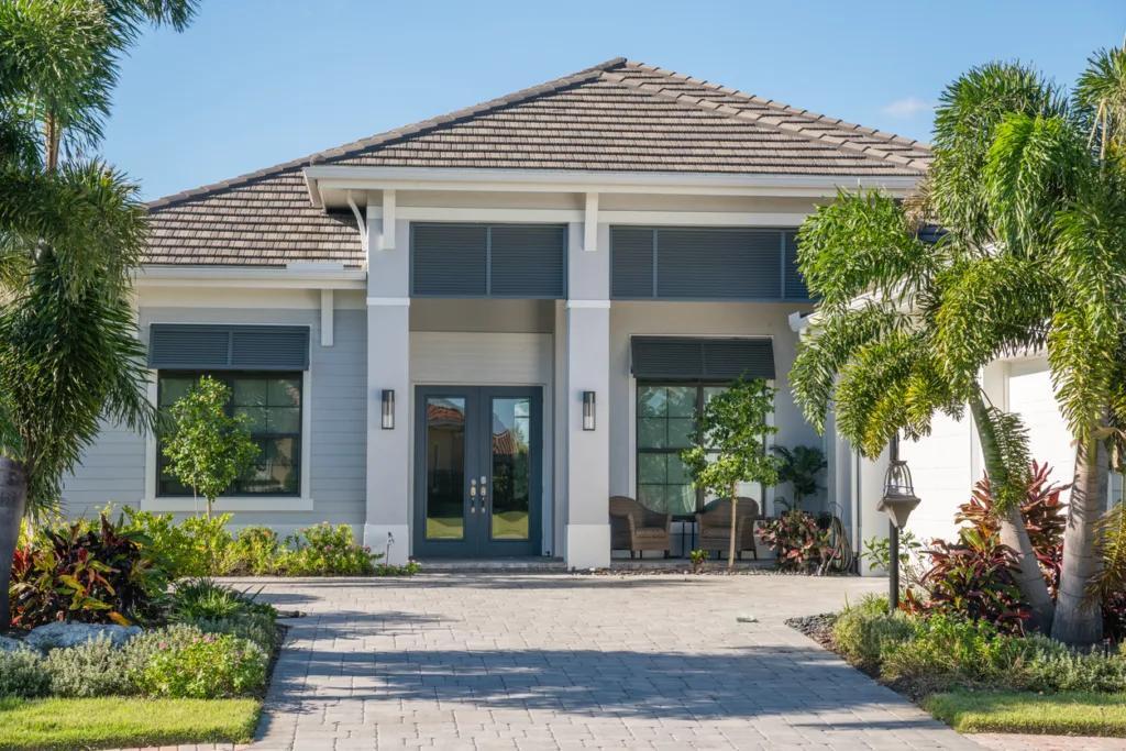 Florida home upgraded with impact-resistant windows and a reinforced roof for hurricane protection.