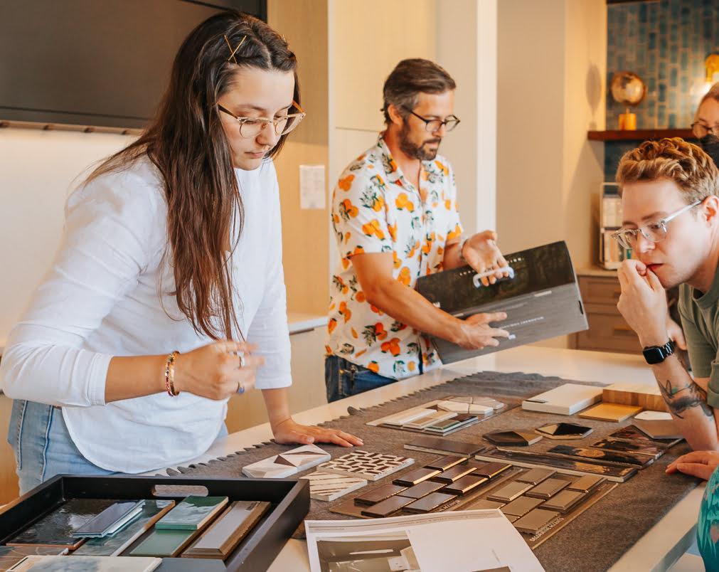 Florida remodeling professionals helping a homeowner select durable renovation materials
