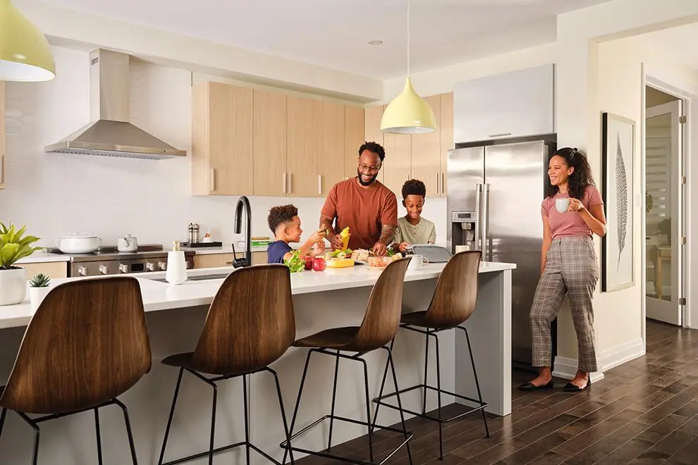 Modern open-concept kitchen with a spacious island designed for cooking and family gatherings.