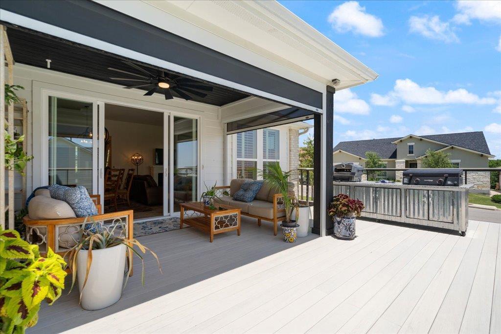 Low-maintenance Florida outdoor living space with composite decking and tropical landscaping